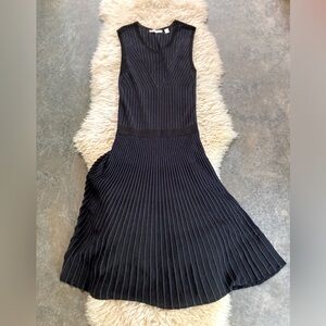 Hugo Boss knit dress in modern black and blue strips. Size 4.